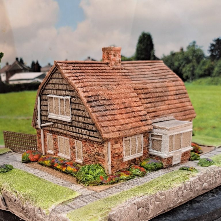 Unique bespoke hand sculpted miniature replica homes and houses and wedding venues