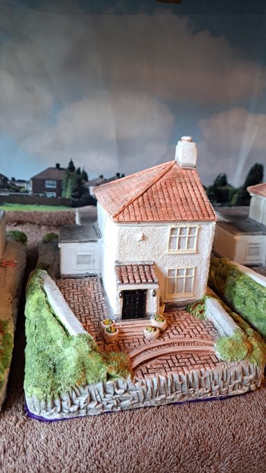 Unique bespoke hand sculpted miniature replica homes and houses