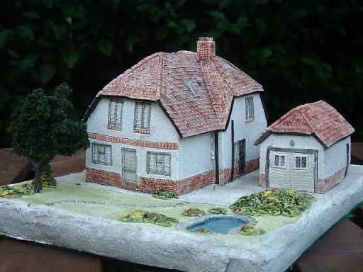 Unique bespoke hand sculpted miniature replica homes and houses